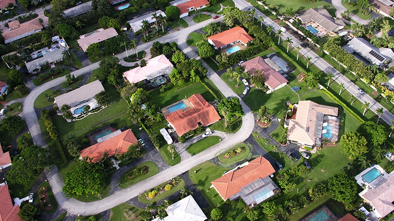 Aerial drone view of a Florida neighborhood inspection service